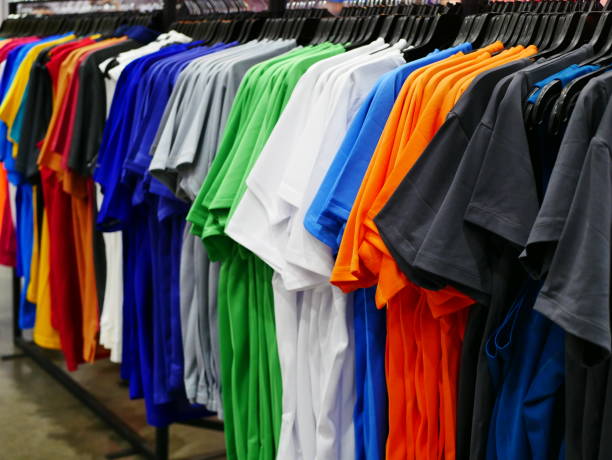 istock Casual shirts on hangers 955491318