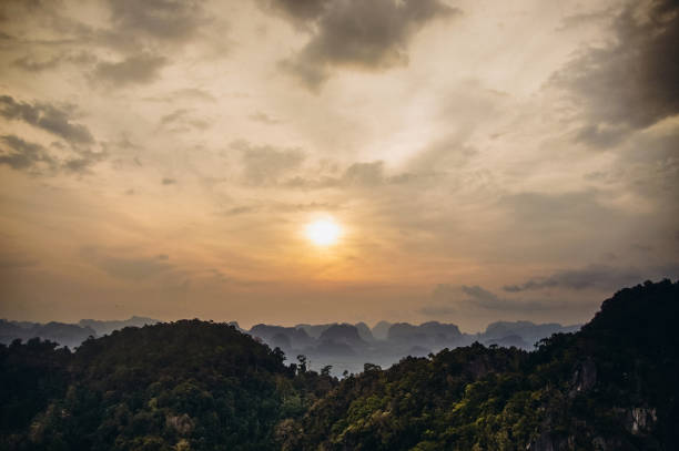 istock sunset in mountains of Thailand evening rainforest 955492006