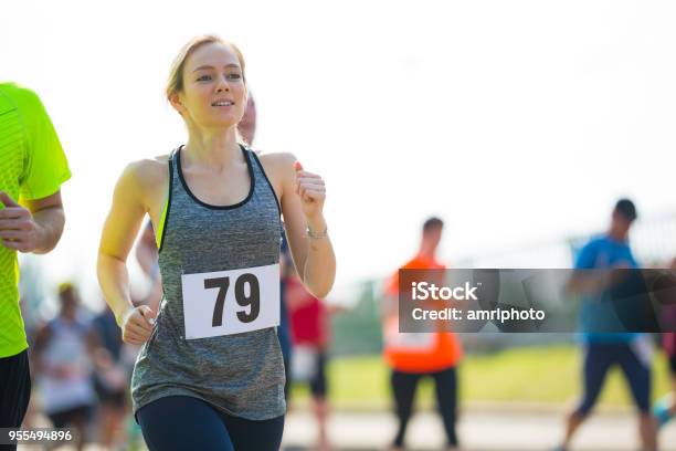 Jogging Concepts. Portrait of Professional Female Runner During