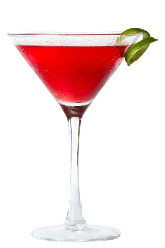 isolated cosmopolitan on a white background garnished with a lime
