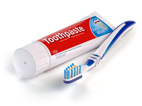 Toothbrush and tube of toothpaste isolated on white background. 3d illustration\nAll textures were created me in Adobe Illustrator.