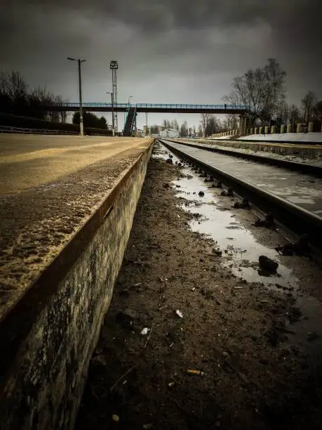 A photo of a stormy day at a railroad station in Dno, Russia