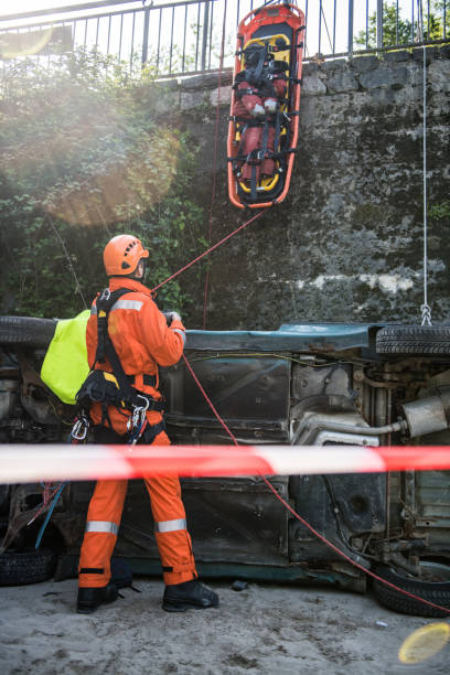 istock Firefighters in a rescue operation of car accident 955495632