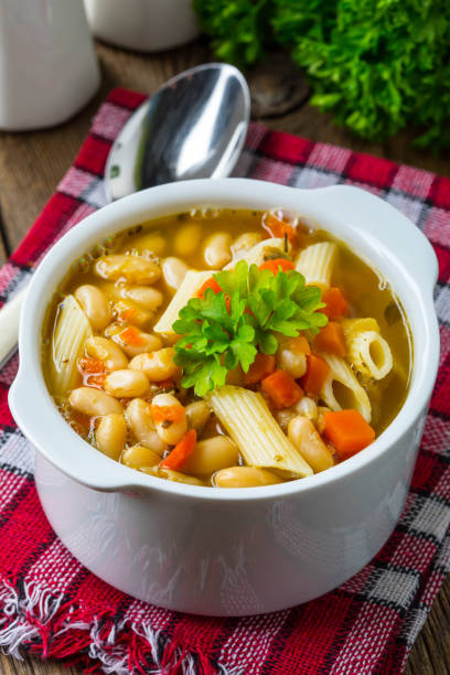 istock Bean soup with penne pasta. 955498430