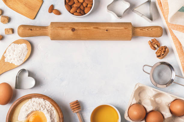 istock Ingredients for baking  - flour, wooden spoon, rolling pin, eggs. 955501474