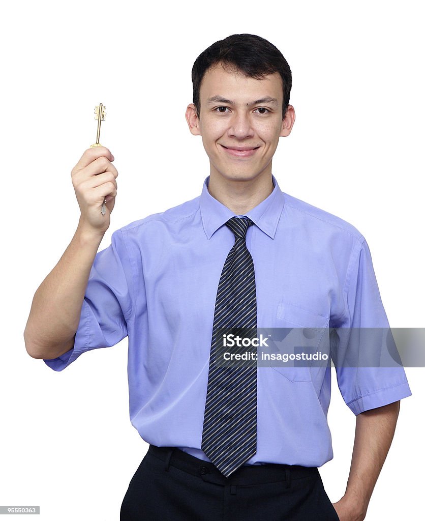 Joven empresario con una llave - Foto de stock de Abierto libre de derechos