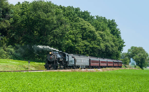 istock Steam Passenger Train at Station 955515734