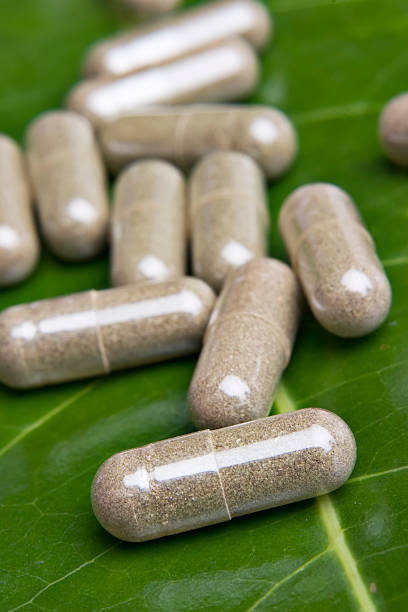 istock Close-up of vitamins on green leaf 95552230