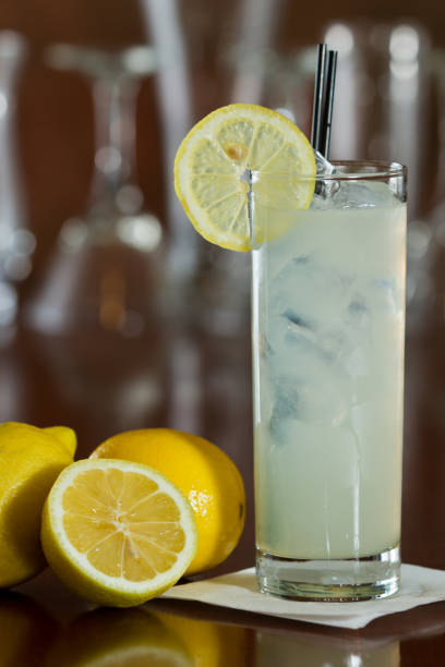 lemonade cocktail tall glass served in a bar with vodka and fresh lemonade cocktail bar busy stock pictures, royalty-free photos & images
