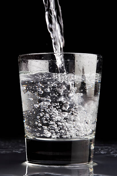 istock Pouring a glass of water / cocktail 95553320