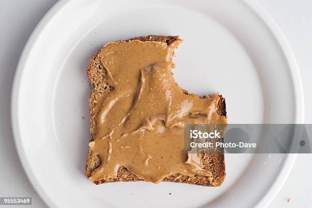 Peanut Butter On Bread Stock Photo - Download Image Now - Peanut Butter, Bread, Missing Bite