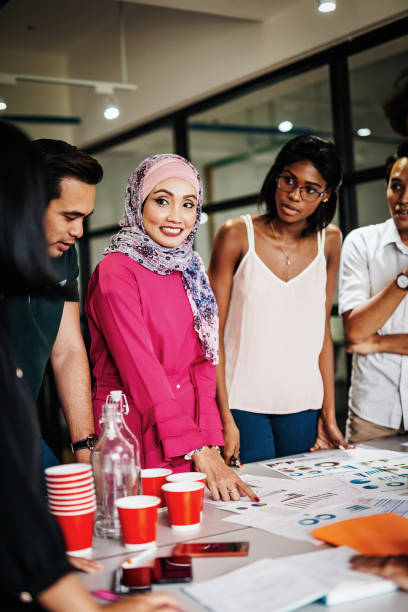 istock Multi ethnic team in global company 955554908