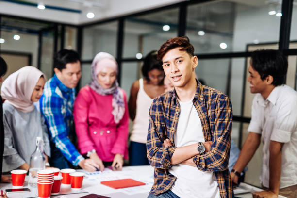 istock Portrait of young student involved in project development 955555692