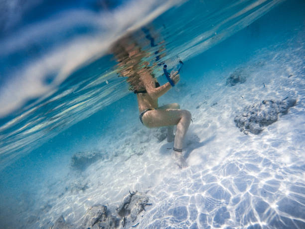 istock Young Woman Enjoying in Sea 955555762