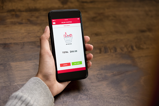 Grocery shopping online concept, customer ordering and paying digitally on mobile phone application