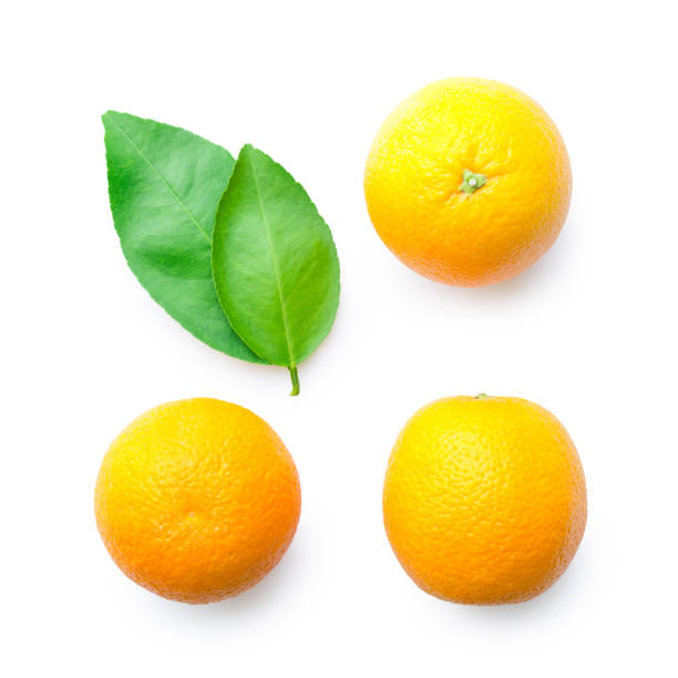 istock fresh orange isolated on white with green leaves in top view 955578576