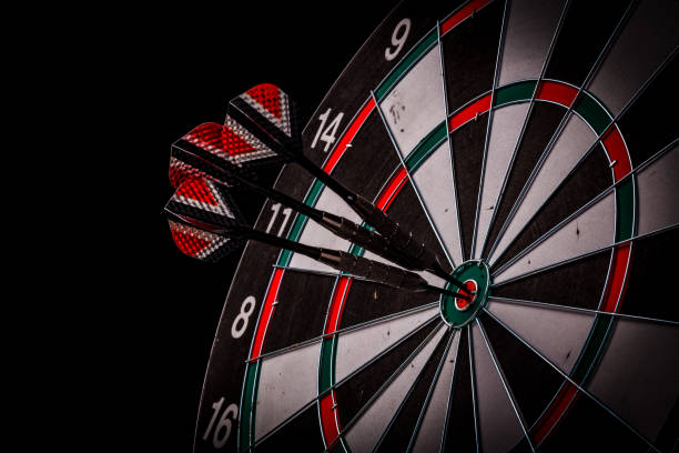 istock red three darts arrows in the target center 955578670