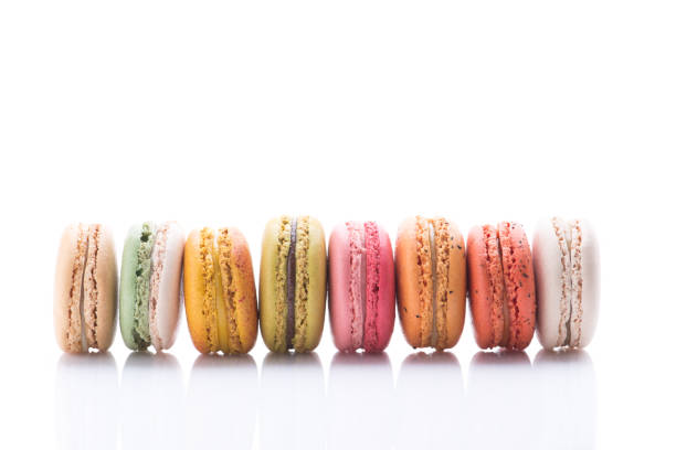 istock Colorful macaroons. Sweet macarons on white background. 955579106