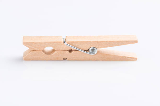 istock Wooden clothespin on white background 955579254