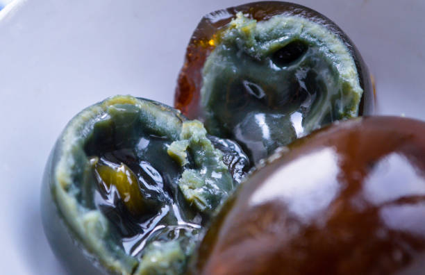 Close up of Chinese century eggs in white bowl stock photo