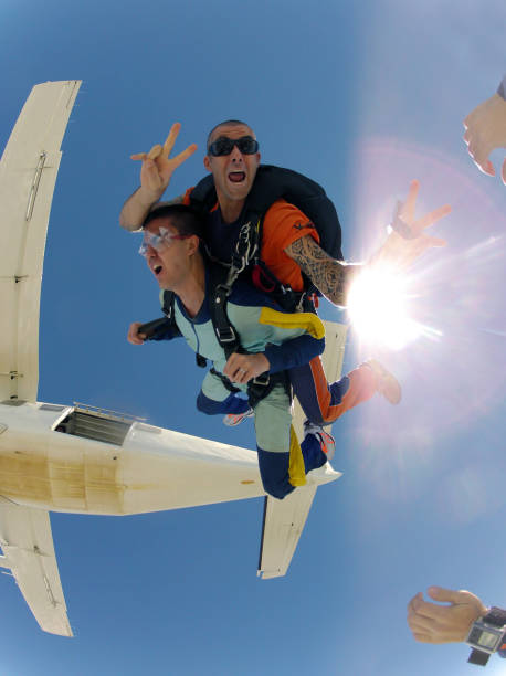 istock Skydive Tandem jump out of the plane 955589242
