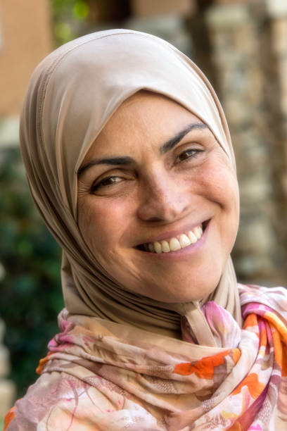 istock Muslim mature woman looking at the camera 955612370