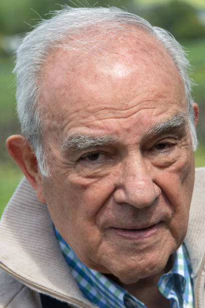 istock Pensive senior man looking at the camera 955615670