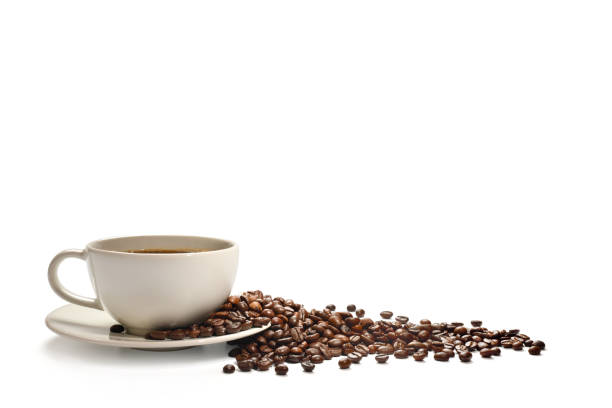 Coffee beans fall into the cup.