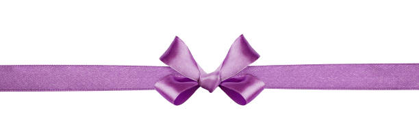 istock Violet silk ribbon and a bow 955618654