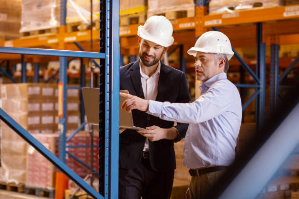 istock Nice serious man pointing at the shelf 955619414