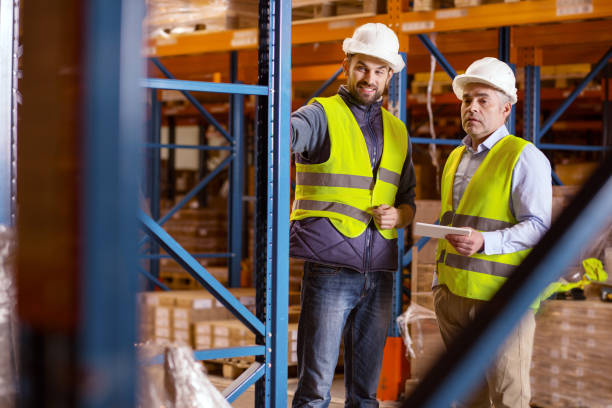 istock Positive nice man talking to his colleague 955619730