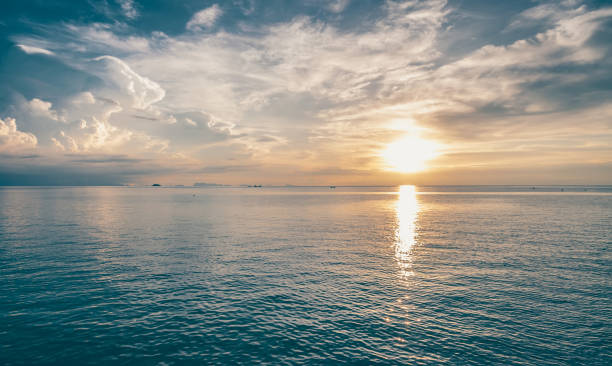 istock Bright colorfull sunset on the sea Thailand 955628082