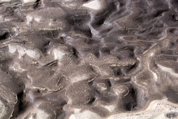 istock texture of wet sand and clay 955628300