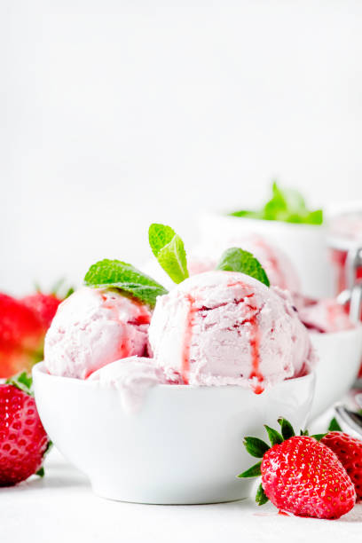 istock Strawberry ice cream with topping, decorated with mint leaves 955628798
