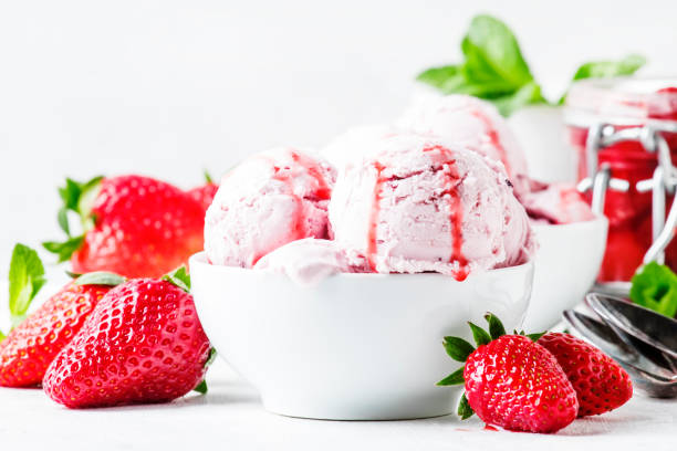 istock Strawberry ice cream with topping, decorated with mint leaves 955628946