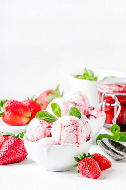 istock Strawberry ice cream with topping, decorated with mint leaves 955628978