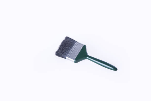 istock paint brush. paint brush on background. paint brush on a background 955633610