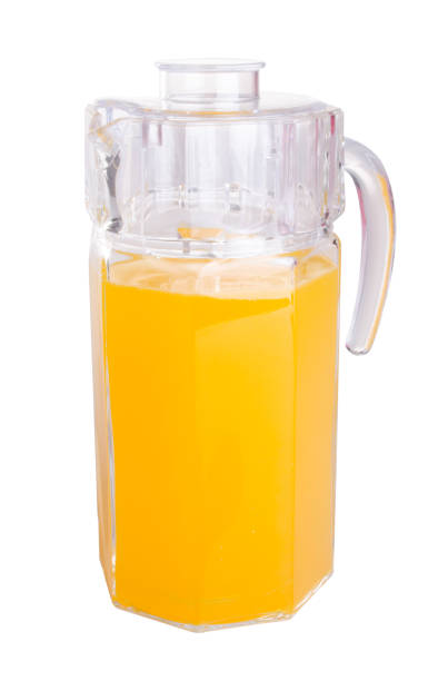 istock orange juice on a background. 955640390