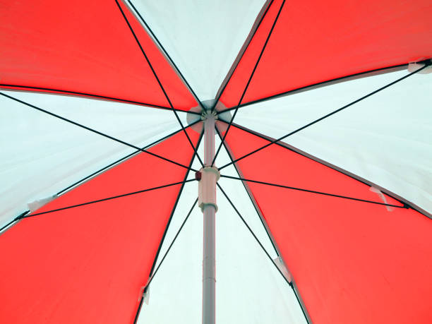 istock Umbrella close-up. Colorful background. 955642534