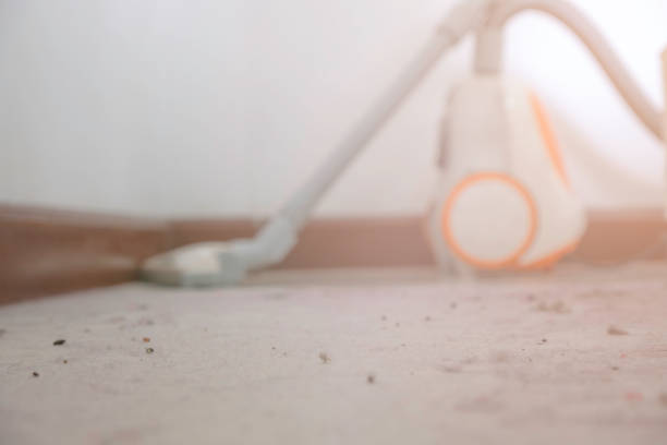 istock Dust on the floor with vacuum cleaner 955645722