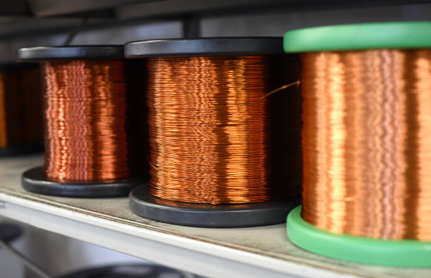 istock Row of copper wire coils in close up view 955648734