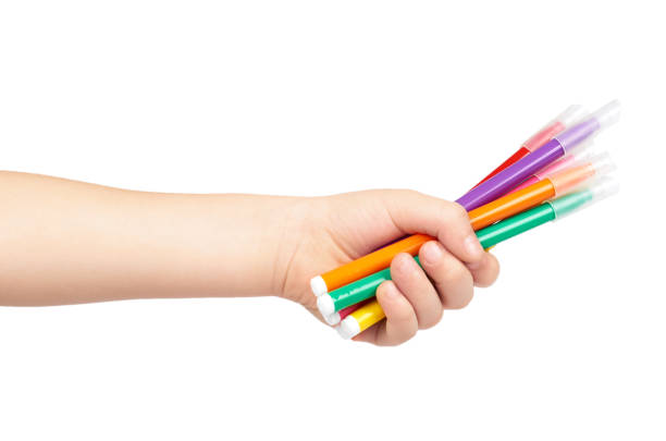 istock Kid hand hold color felt pen with hand, isolated on white background 955650064
