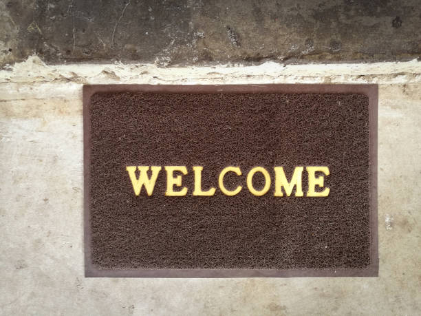 istock Welcome carpet on old cement floor vintage backgroundnd 955654010