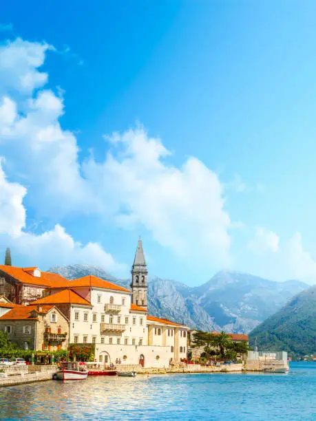 Photo of Harbour and boats in sunny day at Boka Kotor bay (Boka Kotorska), Montenegro