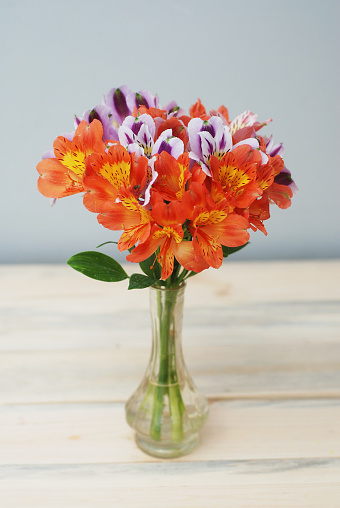 Spring Flowers Orange alstromeria flwoers in Glass Vase Wooden gift Bouquet