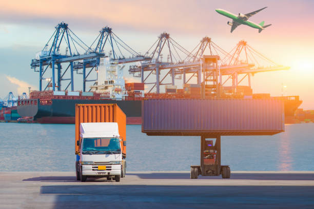 istock Logistics and transportation of Container Cargo ship and Cargo plane with working crane bridge in shipyard at sunrise, logistic import export and transport industry background 955656778