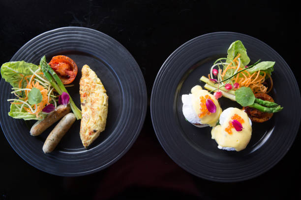 istock Breakfast served of juice, coffee, egg and omelette. Balanced tasty diet 955656998