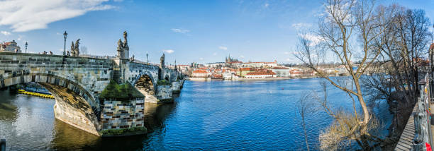istock Charles bridge over Vltava river and castle in Prague 955664414