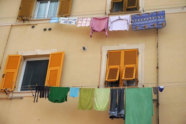 istock Clothes hanging from italian house in Genoa 955681368