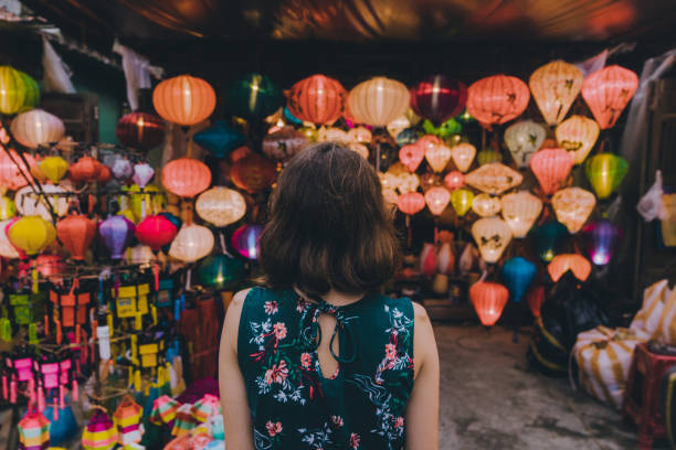 istock Woman choosing lanterns in Hoi An 955685342